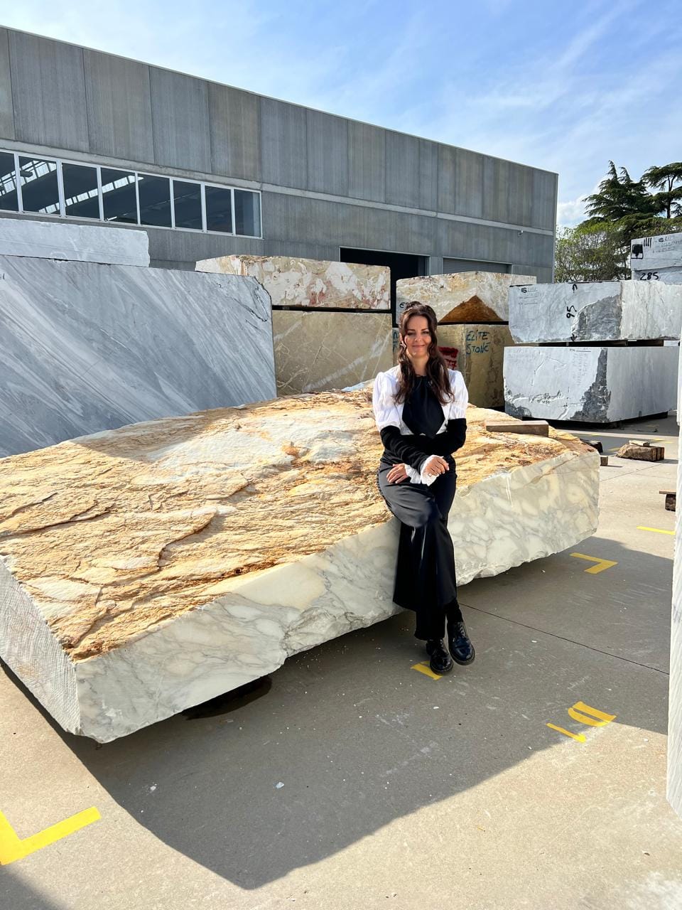 Hand-selecting a natural stone slab at the stone yard